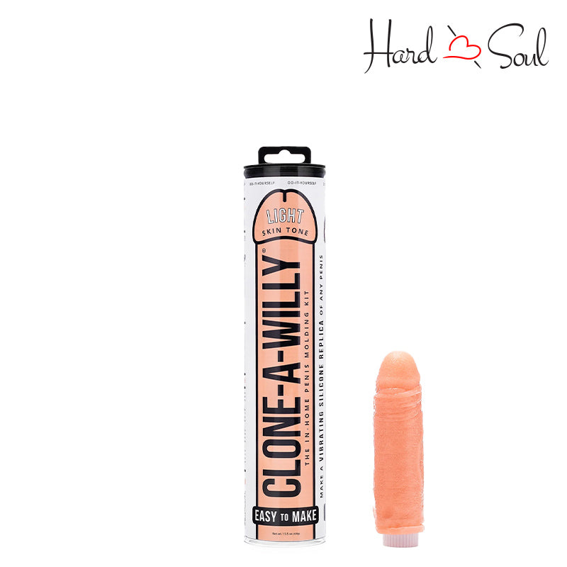 A box of Clone-A-Willy Light Skin Tone Vibe Kit and a molded dildo next to it - HardnSoul