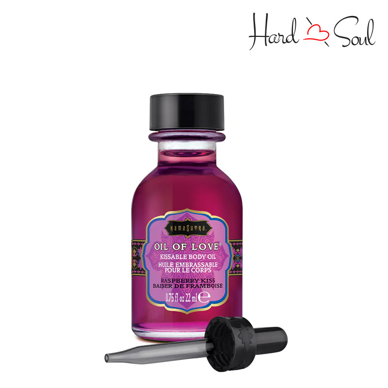 A Bottle of Kama Sutra Oil of Love Raspberry Kiss - HardnSoul