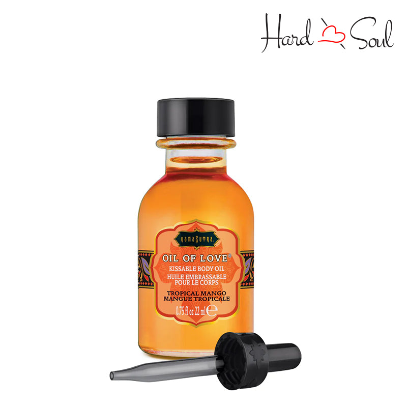 A Bottle of Kama Sutra Oil of Love Tropical Mango - HardnSoul