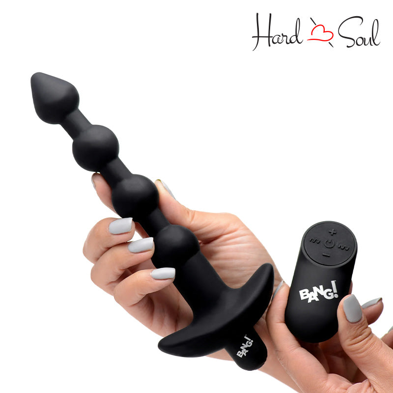 A Bang Remote Control Vibrating Silicone Anal Beads Black in hand - HardnSoul