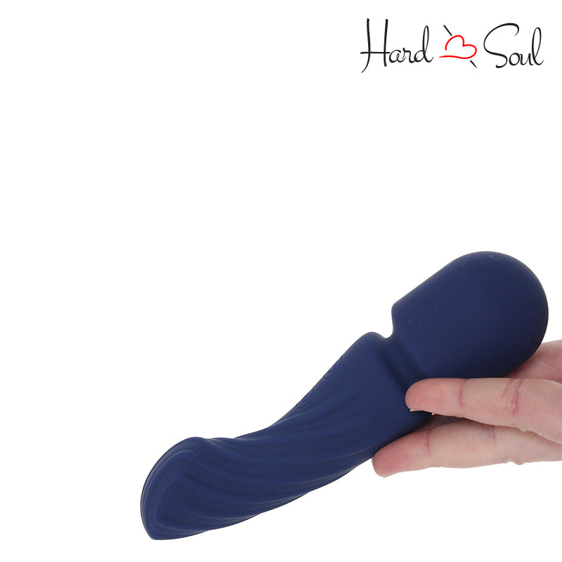 In hand of Charisma Allure Rechargeable Silicone Massager Wand Blue - HardnSoul