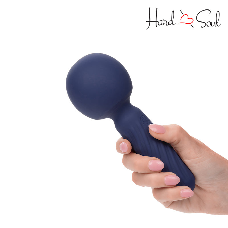 A Hold holding Charisma Seduction Rechargeable Silicone Massager Wand Blue - HardnSoul