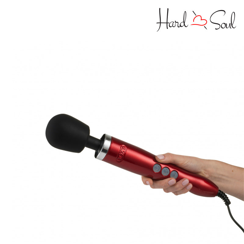 A Doxy Die Cast Wand Massager Red in hand - HardnSoul
