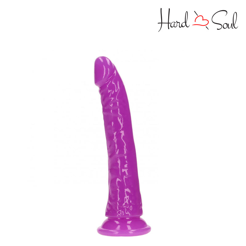 Front Side of a RealRock Glow in the Dark 7 Inch Slim Dildo Purple - HardnSoul