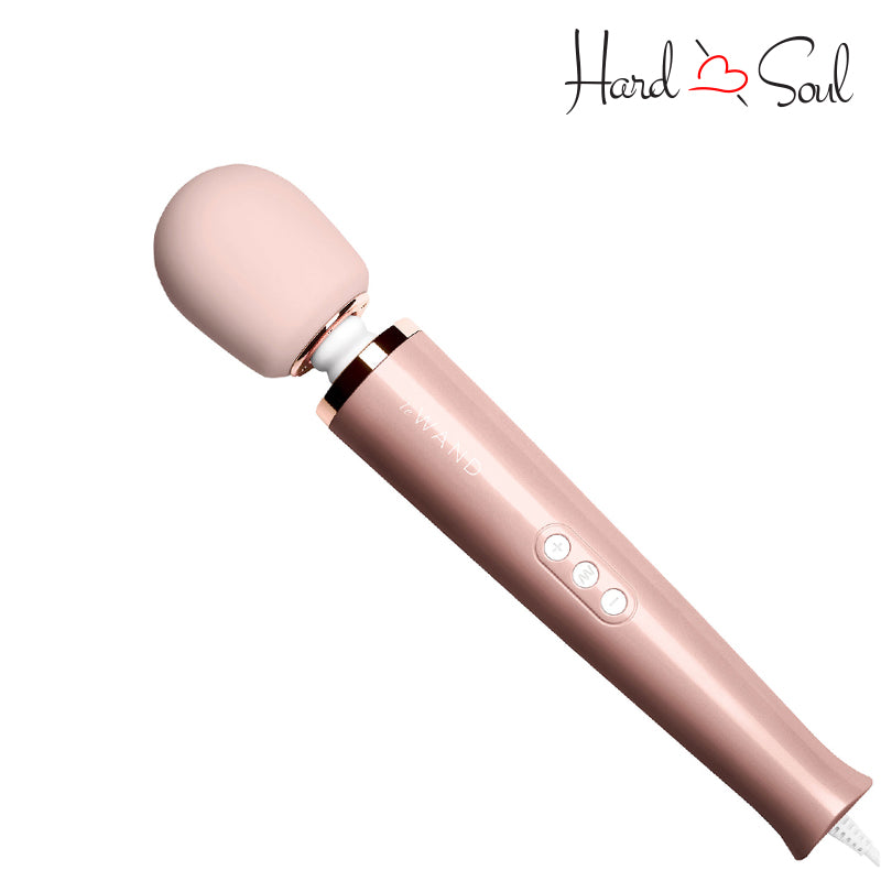 Side of a Rose gold Le Wand Plugin Vibrating Massager showing its buttons- HardnSou