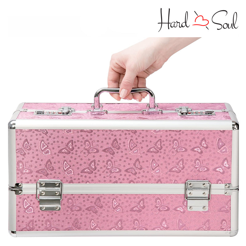 A Hand Holding a Large Pink Lockable Vibrator Case - HardnSoul