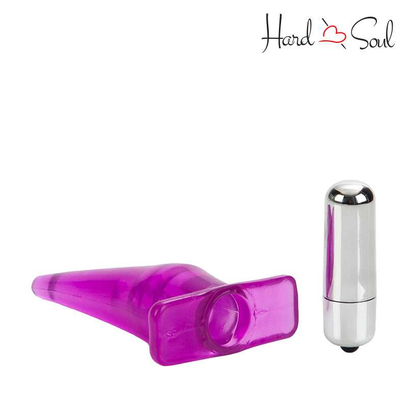 A Mini Vibro Tease Pink and a batterie next to it - HardnSoul