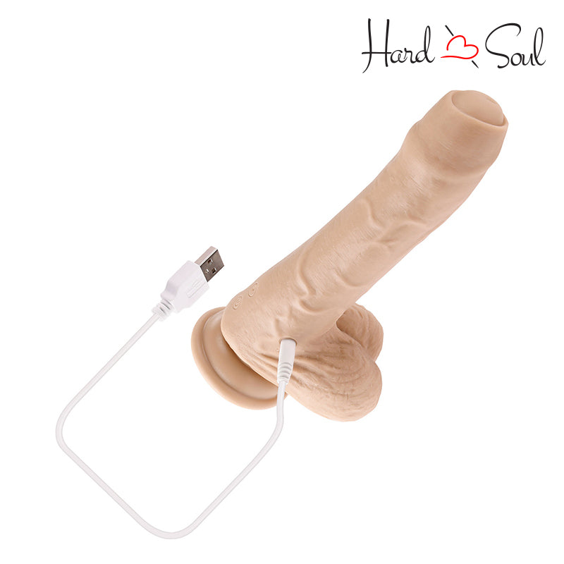 Peek A Boo Vibrating Dildo Vanilla with its charging cable - HardnSoul