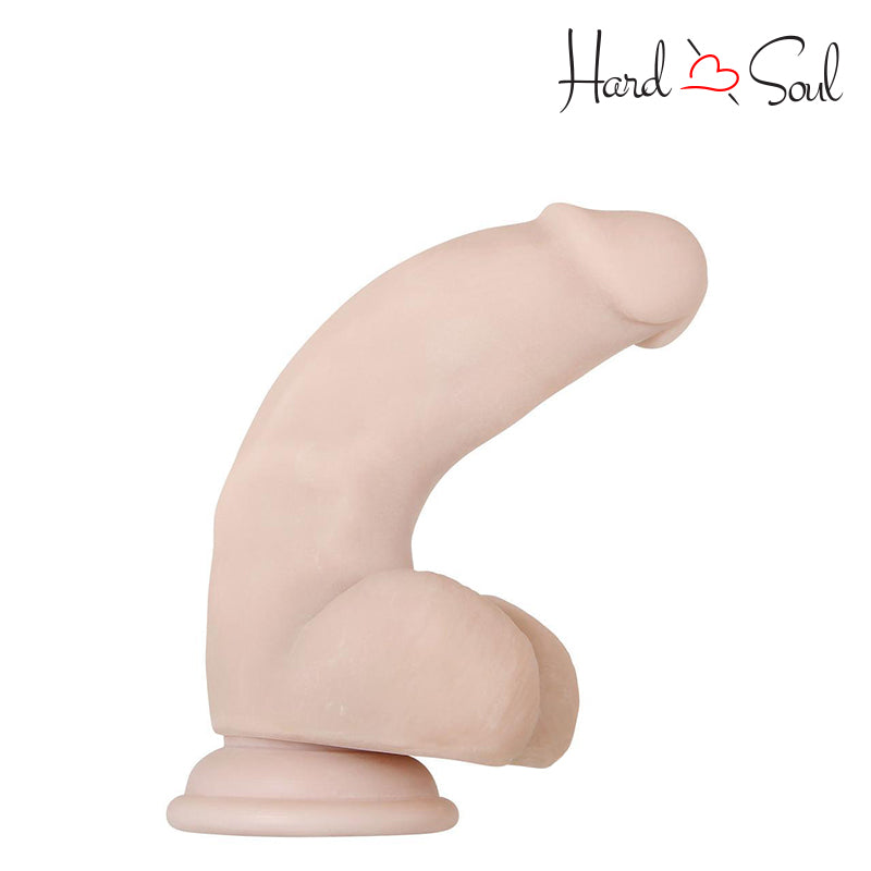 Side of a tilted Real Supple Poseable 7 Inch Dildo with Balls Vanilla - HardnSoul