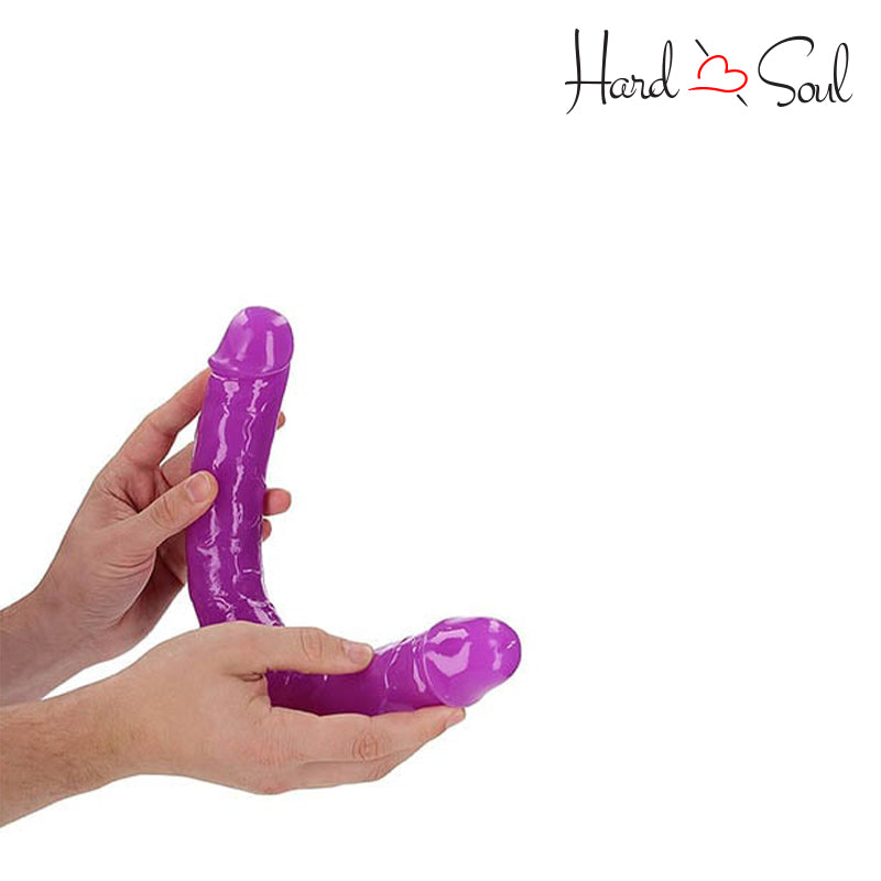 Tilted RealRock GITD 15 Inch Double Dildo Purple in two hands - HardnSoul