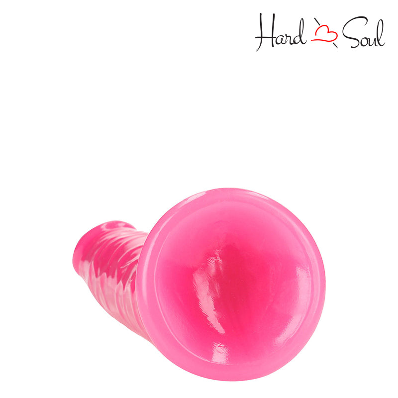 Bottom side of RealRock Glow in the Dark 7 Inch Slim Dildo Pink - HardnSoul