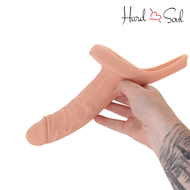 A Size Matters 2 Inch Vibrating Penis Sheath W/Remote Light in hand - HardnSoul