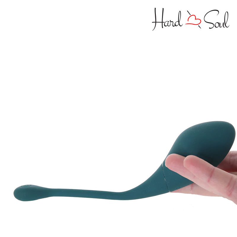 A Twitch 2 Silicone Suction & Egg Vibrator Green in hand - HardnSoul